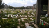 جانب من الدمار في مقبرة الشهداء في مخيم اليرموك