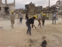  بالصور: تنظيف مقبرة الشهداء في مخيم اليرموك وإزالة الركام منها وترميم بعض القبور فيها