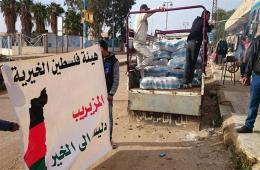 Palestine Charity Committee distributes aids at Al Muzaireib compound