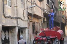 Palestine Charity Committee tries to alleviate the consequences of water cut in the Yarmouk camp.