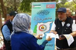 Distribution of Some Financial Aid to Palestinian Syrian Families in the Turkish City of Gaziantep 