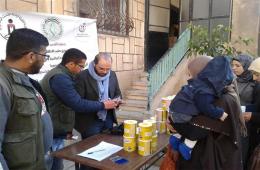 Al-Marhama Campaign distributes Children milk in Syria.