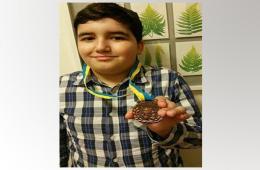 Palestinian Syrian child wins first prize in regional Chess Championship in Sweden