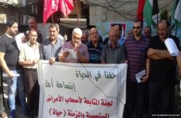 Palestinian-Syrians demand an emergency relief plan for them during their sit-in in Beddawi camp, located in north Lebanon