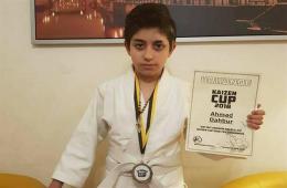A Palestinian-Syrian child wins second place in one of the local judo championships in Germany