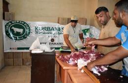 Charity Hands over Meat Portions to Palestinian Families South of Damascus