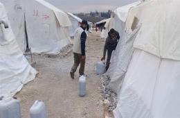 Relief Commission Distributes Fuel Supplies to Displaced Families in Deir Ballout Camp