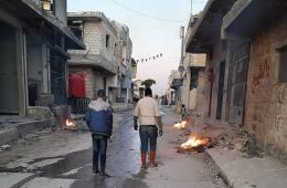 Civilians in Handarat Camp for Palestinian Refugees Burn Trash in Residential Alleyways