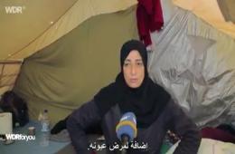 Palestinian Woman and Her Sightless Son Launch Cry for Help from Greek Camp