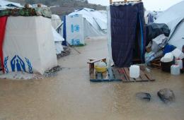 Tents Swamped by Heavy Rain on Greek Island