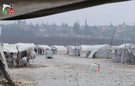 فصل الشتاء يزيد من معاناة مهجري مخيم دير بلوط شمال سورية 