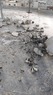 اثار الدمار الذي لحق بمخيم النيرب جراء استهدافه ب 4 صواريخ