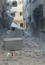 آثار الدمار الذي لحق بحارات عين غزال غربي مخيم اليرموك نتيجة القصف المستمر
