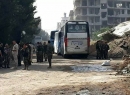 صور توثق خروج عناصر قوات المعارضة السورية وعوائلهم من بلدات جنوب دمشق نحو الشمال السوري 