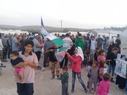 جانب من الاعتصام الذي نظمه المهجرين الفلسطينيين في مخيم دير بلوط شمال سورية.