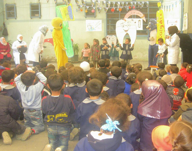 نشاط (صحتي في أسناني) لأطفال روضة الأمل في مخيم اليرموك