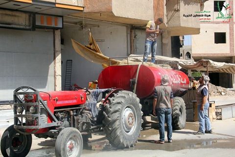 "هيئة فلسطين الخيرية" تستمر بتقديم خدماتها لنازحي "اليرموك" في يلدا 