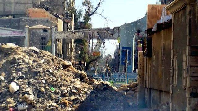اشتباكات بين داعش والفصائل الفلسطينية الموالية للنظام في مخيم اليرموك 