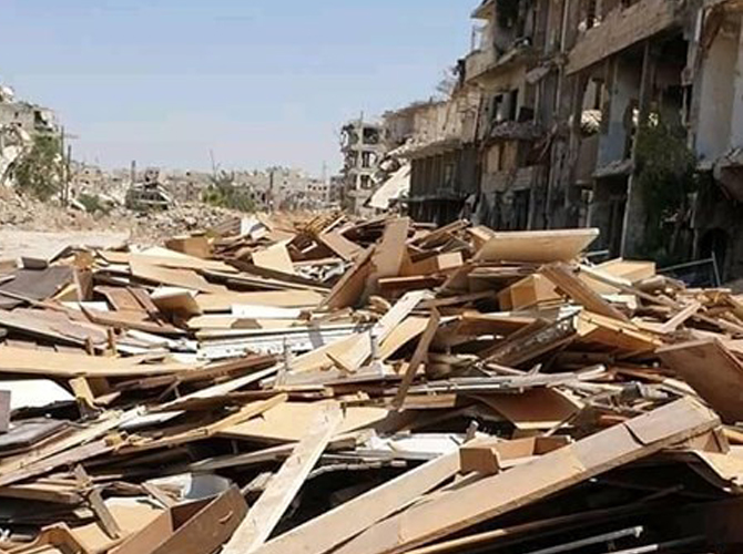 مخيم اليرموك ما يزال التعفيش مستمراً وسكانه يتندرون "حاميها حراميها" 