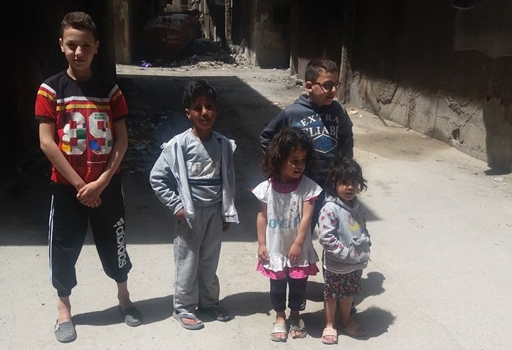 دعوات لتقديم يد العون لأهالي مخيم اليرموك 