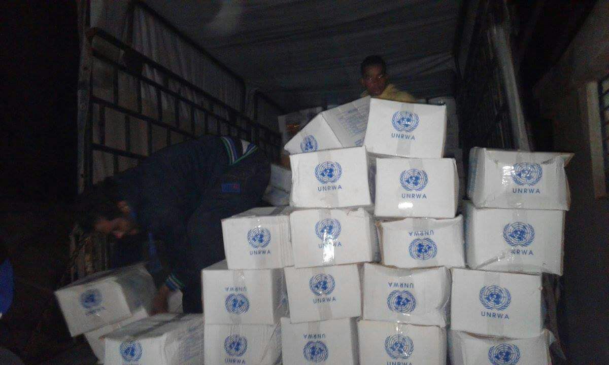 الأونروا في سوريا تبدأ توزيع مساعداتها الغذائية في مخيم العائدين في حماه