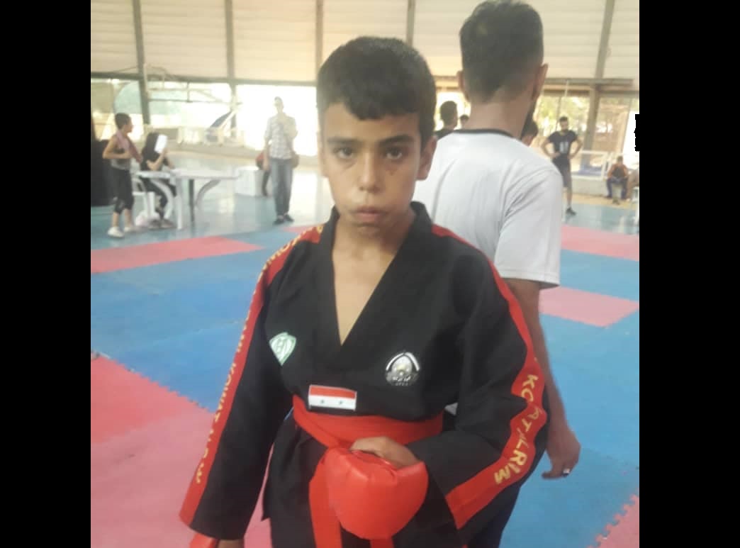 فتى فلسطيني يفوز بالمركز الثالث ببطولة الجمهورية للفنون القتالية