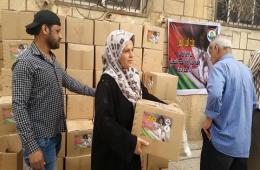 الهيئة الخيرية  توزع مساعداتها الغذائية على اللاجئين الفلسطينيين في ريف دمشق   