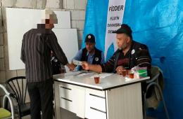 توزيع مساعدات نقدية على اللاجئين الفلسطينيين المهجرين من سوريا في مدينة كيلس التركية 