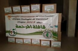 قافلة "المرحمة" توزيع مساعداتها على أهالي اليرموك في يلدا 