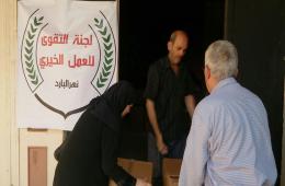  توزيع 363 طرد غذائي على فلسطيني سوريا المهجرين إلى مخيم البارد شمال لبنان 