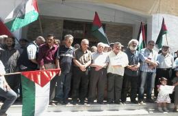 المؤسسات العاملة في مخيم اليرموك تعتصم في الذكرى الثالثة للحصار ويجددون مطالبهم بفتح الطريق وإدخال المساعدات 