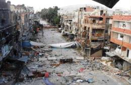 قصف ليلي بالصواريخ على مخيم اليرموك يخلف دماراً في الأبنية 