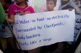 العشرات من أهالي اليرموك يعتصمون لرفع الحصار عن مخيمهم