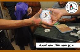 الخيرية توزع علب حليب على أطفال مخيم اليرموك النازحين في يلدا