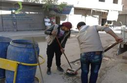 حملة نظافة لحارات والشوارع التي يقطنها نازحي مخيم اليرموك في منطقة يلدا