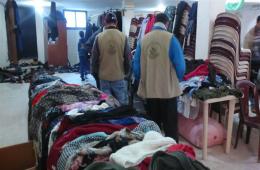 توزيع ملابس شتوية على العائلات الفلسطينية السورية في مخيم نهر البارد