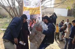 فلسطين الخيرية توزع مواد التدفئة على المهجرين والمحتاجين جنوب سورية