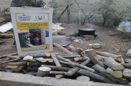 توزيع مادة الحطب وألبسة شتوية على عدد من عائلات مخيم خان الشيح