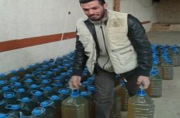 توزيع وقود التدفئة على (200) عائلة فلسطينية سورية في مخيم الجليل بلبنان 