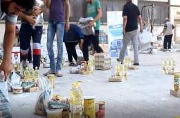 توزيع (450) سلة غذائية على العائلات الفلسطينية جنوب دمشق 