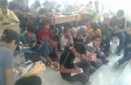 طلبة مخيم اليرموك يبدأون عامهم الدراسي جنوب دمشق رغم المعوقات الكبيرة