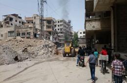 ناشطون: تنفيذ اتفاق خروج فصائل المعارضة المسلحة من بلدات جنوب دمشق سيبدأ غداً