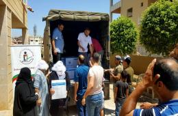 توزيع عدد من السلل الغذائية على اللاجئين بمنطقة سبلين في لبنان 