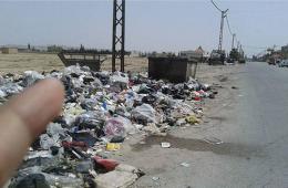 أهالي مخيم خان دنون يشتكون من تراكم النفايات ونقص خدمات البنى التحتية