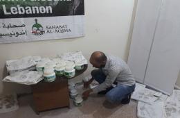 توزيع وجبات الإفطار على 125 عائلة من فلسطينيي سورية في مخيم عين الحلوة