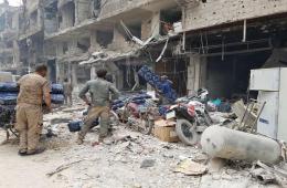 عصابات مدنية بدعم أمني تسرق المنازل في مخيم اليرموك