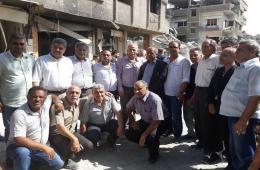 وفد رسمي وفصائلي فلسطيني يزور مخيم اليرموك 