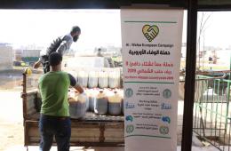 توزيع مساعدات اغاثية ومواد تدفئة على العائلات الفلسطينية والسورية في الشمال السوري