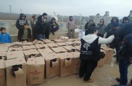 توزيع مدافئ حطب في مخيمي دير بلوط والمحمدية