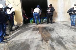 توزيع حصص غذائية ووقود للتدفئة على عائلات فلسطينية سورية بالبقاع اللبناني 